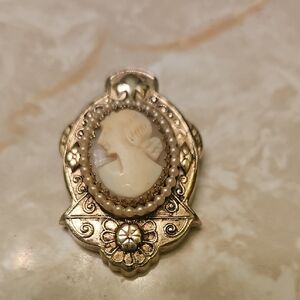 Elegant Gold Coro Cameo Pendant